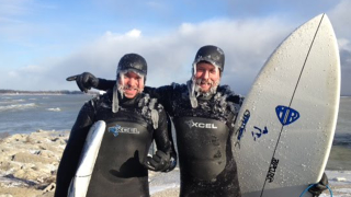 Illustration for article titled These insane people like to surf in ice water